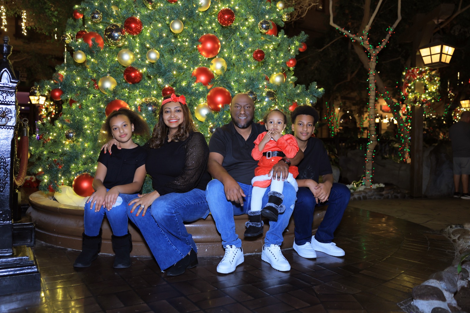 Family at holiday tree