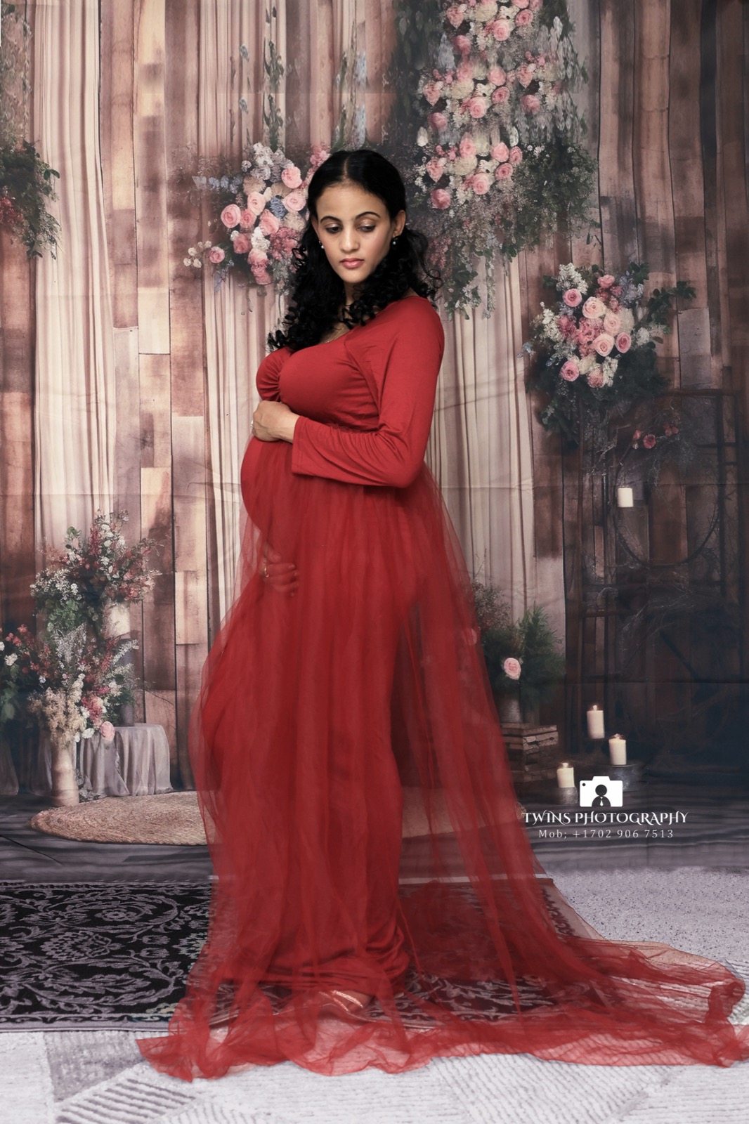 Maternity portrait in red gown